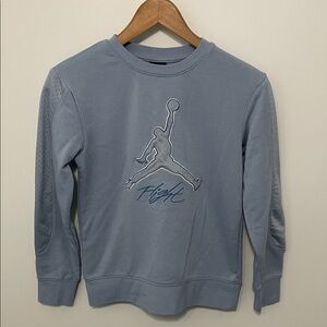 Jordan Sky Blue sweatshirt with basketball texture on logo and sleeves! Size YM
